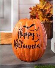 Artificial pumpkin with Happy Halloween greeting