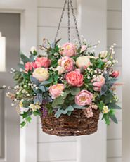 Hanging basket filled with artificial roses