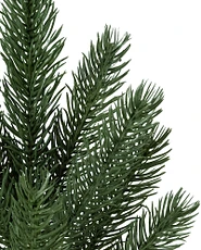 Close up of realistic Vermont White Spruce artificial Christmas tree branch