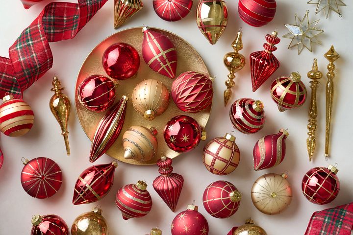 Assorted Christmas tree ornaments with a red and gold theme