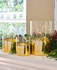 Set of ombre gold glass hurricane lights