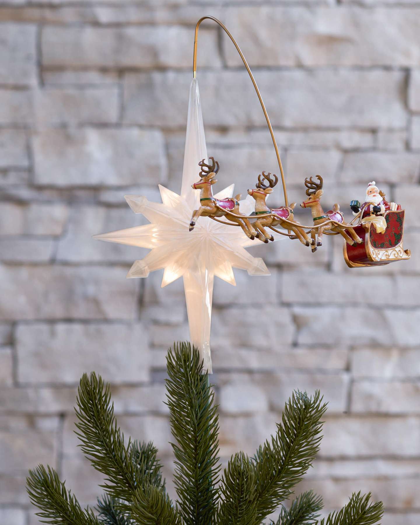 Balsam Hill Santa’s Sleigh Animated Christmas Tree Topper Displayed on Artificial Christmas Tree
