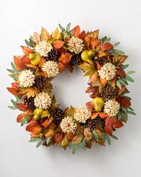 Autumn wreath décor with pears, dahlias, and pinecones