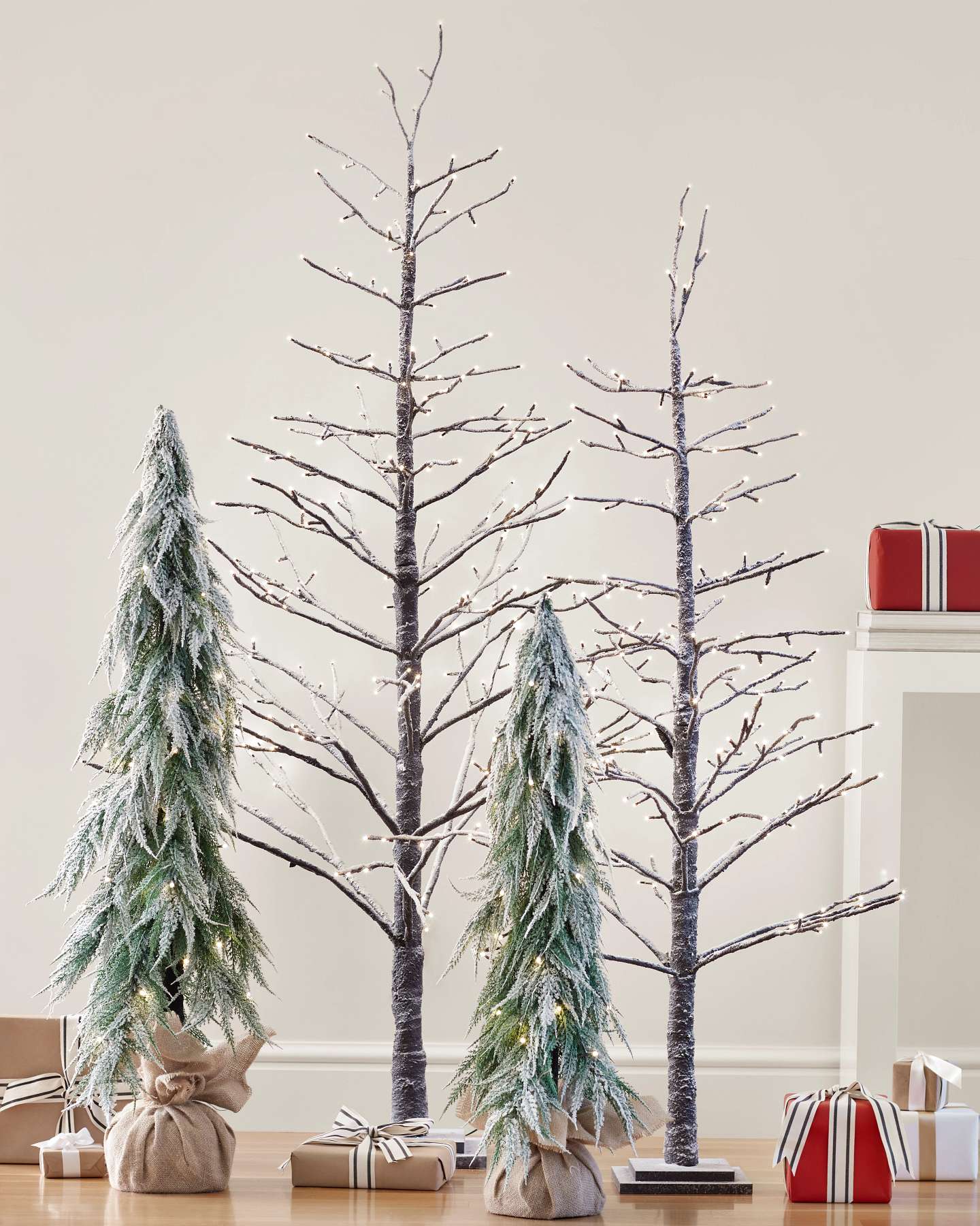 Balsam Hill Snowy Branch LED Artificial Christmas Tree in a Festive Living Room