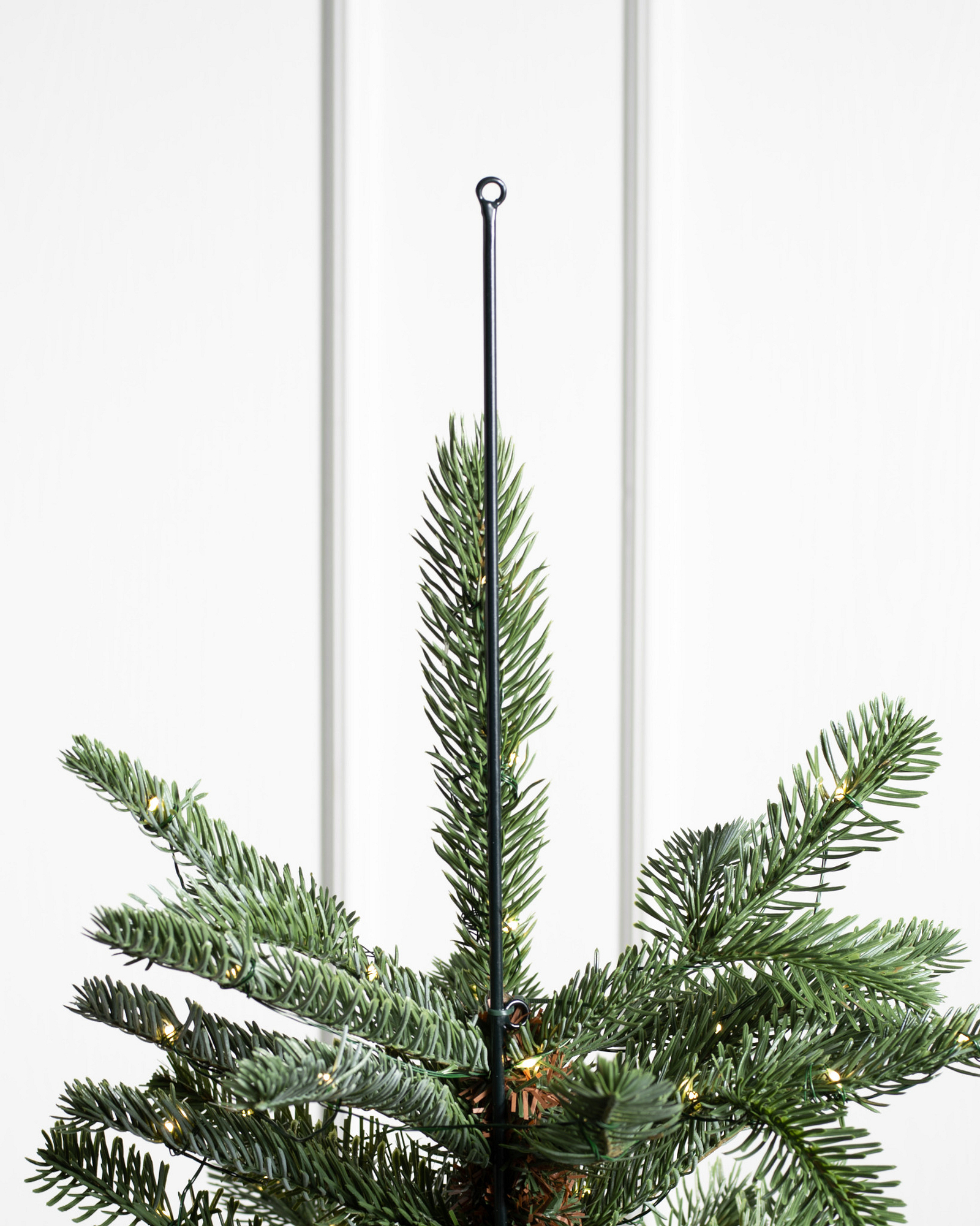 Weihnachtsbaumspitzen und Sterne