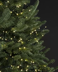 Artificial Christmas tree with light strands