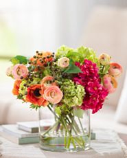 Spring flowers in a clear glass vase