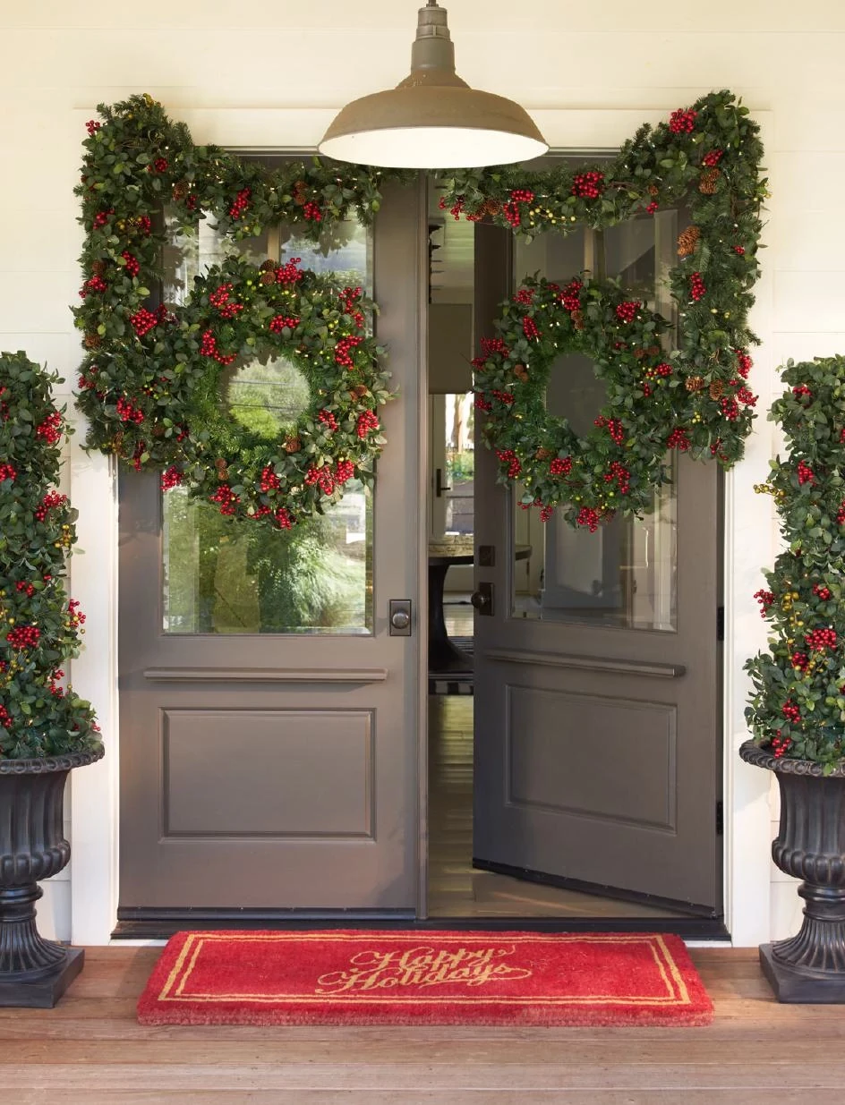 Double doors with Christmas greenery