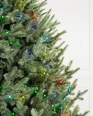 Multicolor Twinkly lights on artificial Christmas tree