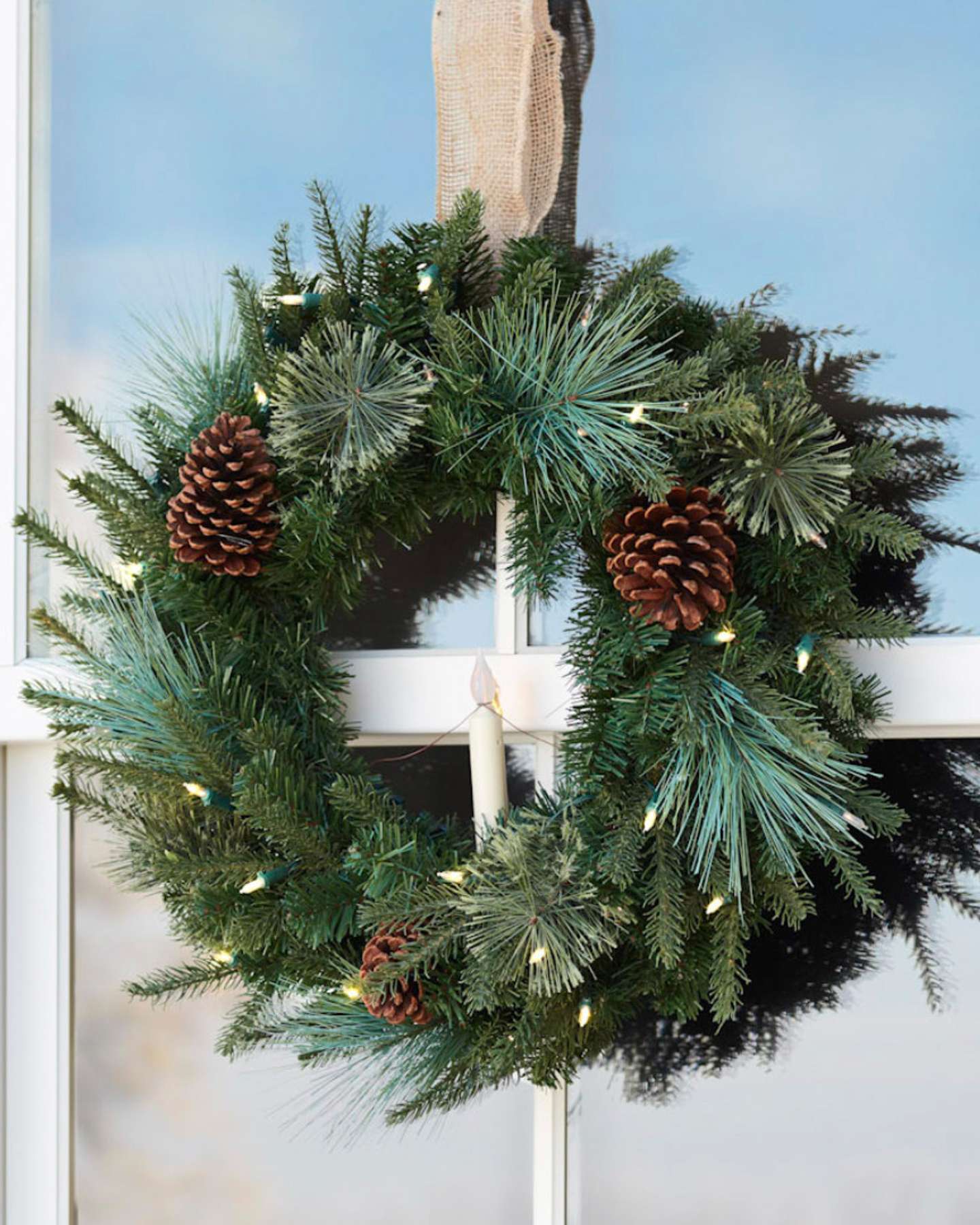 Balsam Hill Mixed Evergreen 22-Inch Artificial Christmas Window Wreath in Studio Setting