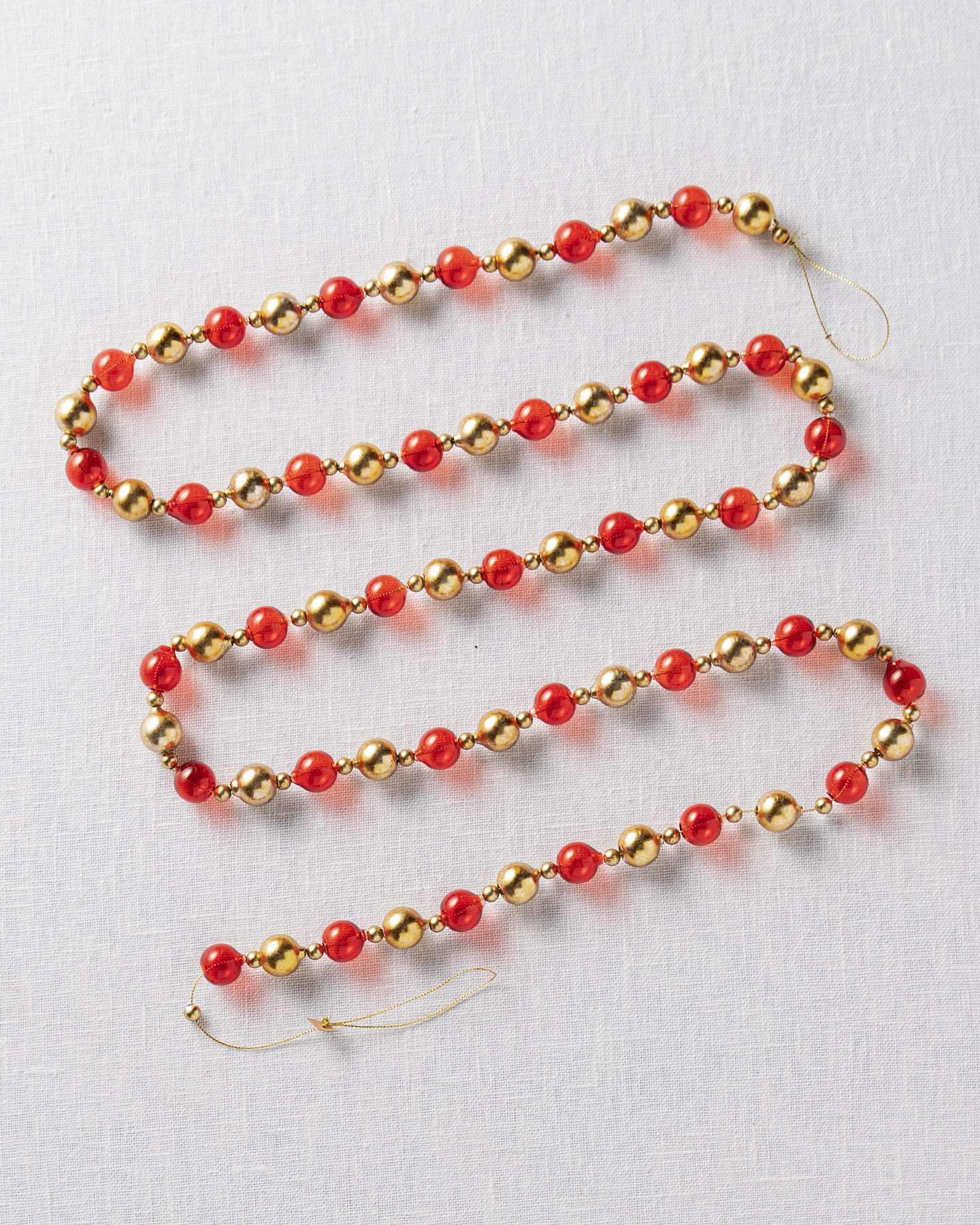 Balsam Hill Red and Gold Bead Christmas Garland Set of 3 Closeup View