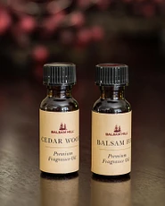 Bottles of scented balsam fir and cedar wood oils