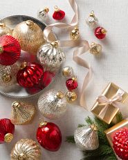 Assorted red, gold, and silver mercury glass Christmas ornaments