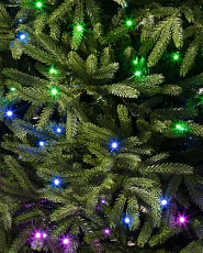 Multicolour Twinkly lights on artificial Christmas tree