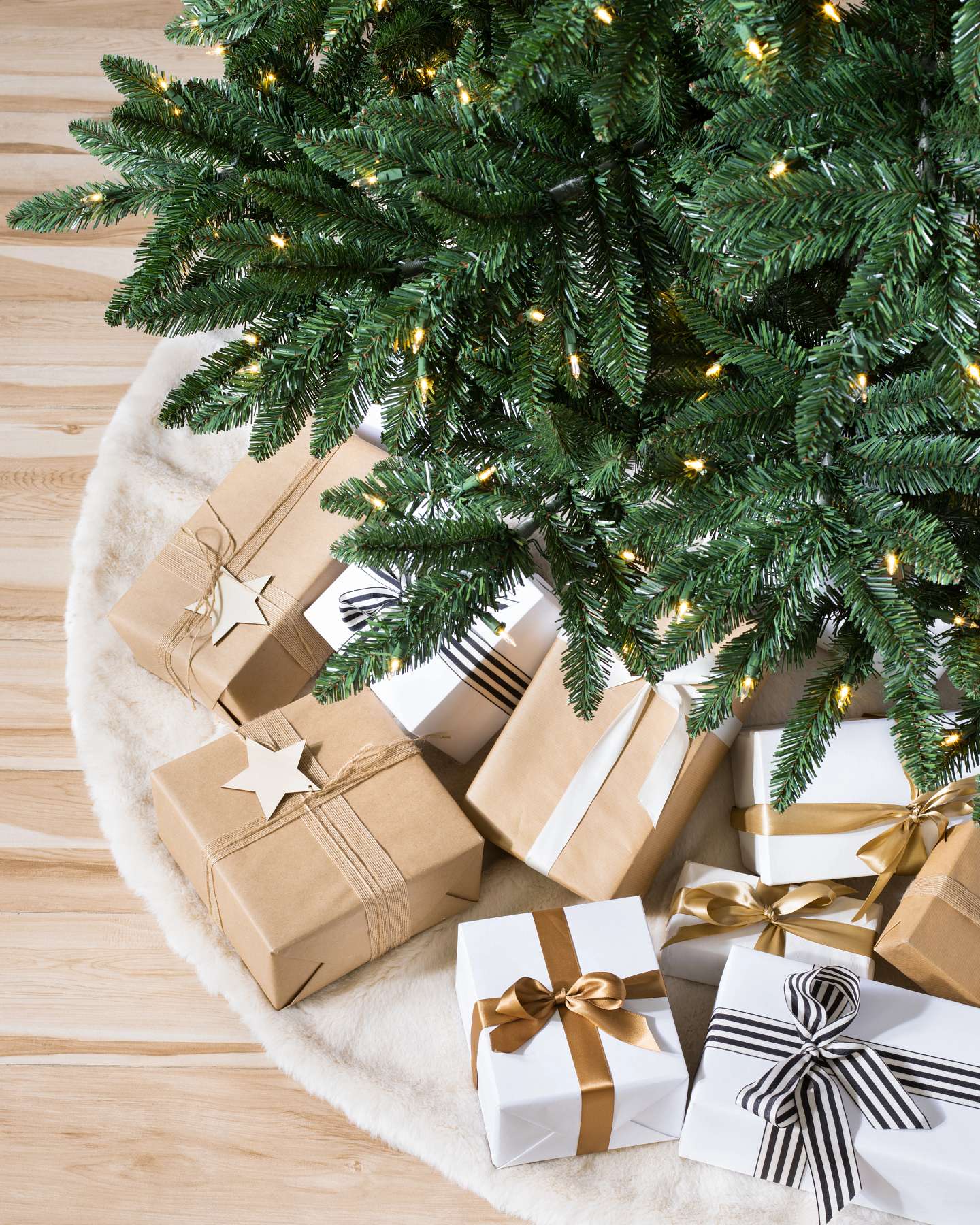 Balsam Hill Classic Evergreen Spruce Artificial Christmas Tree Lifestyle Display with Tree Skirt
