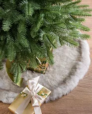 Faux fir tree skirts in gray, brown, and ivory colors