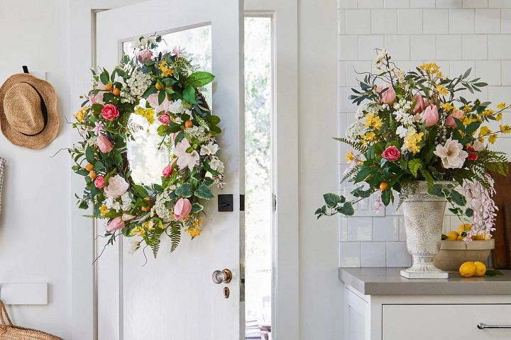 Colorful artificial foliage by the door