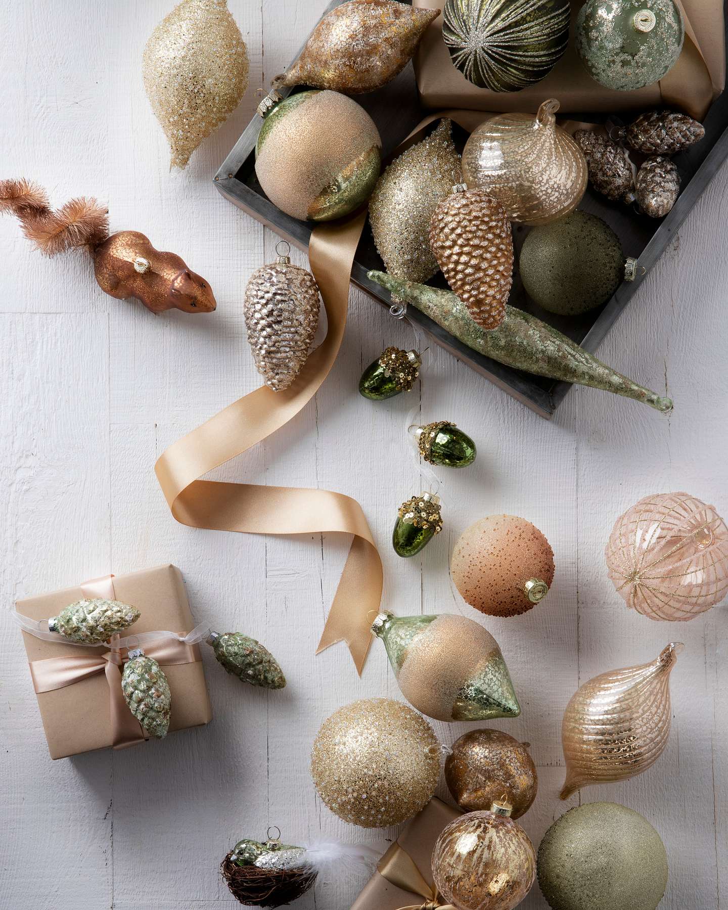 Balsam Hill Grand Forest Christmas Ornament Set Lifestyle Display with White Wooden Background