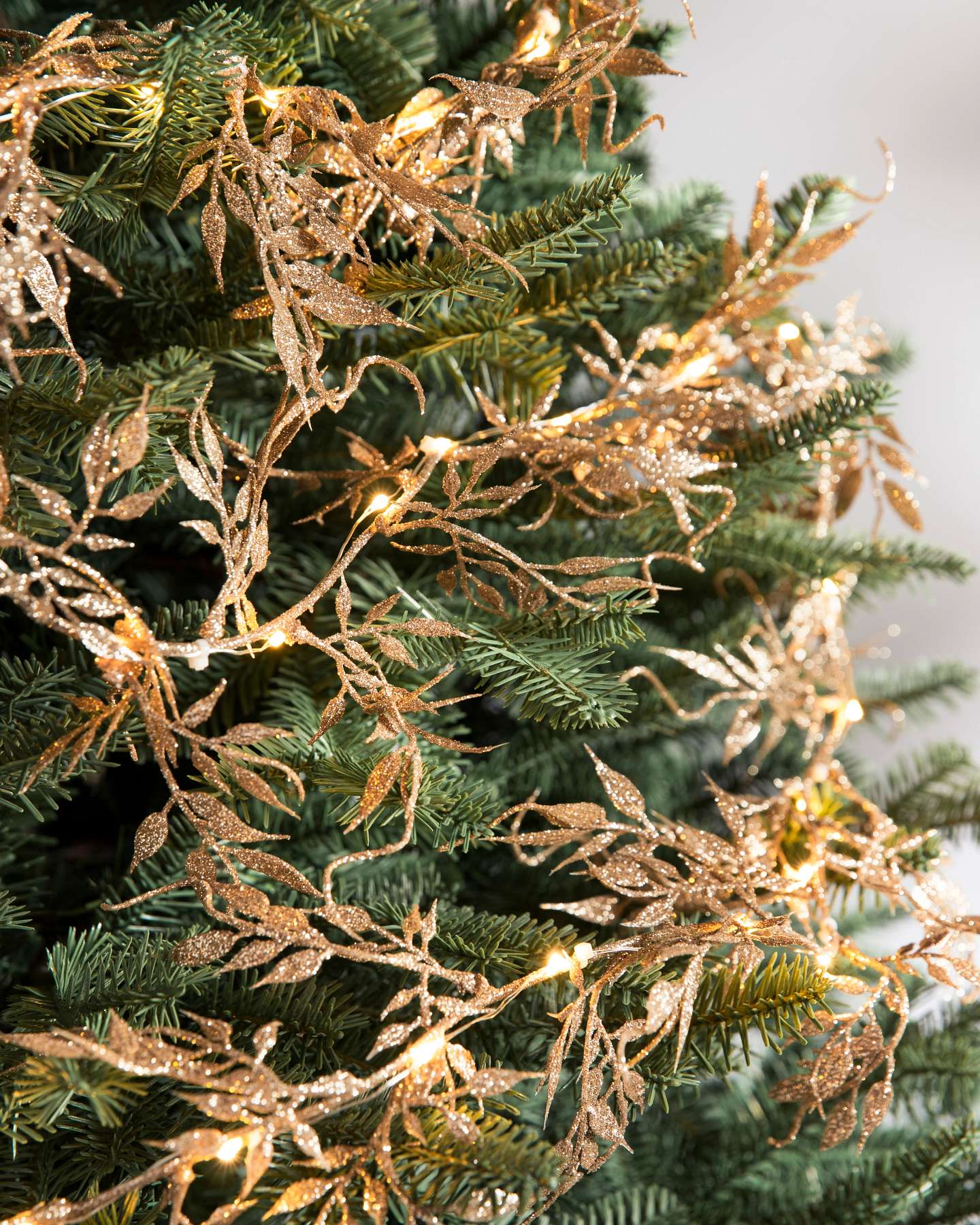 Balsam Hill Champagne Glitter Leaf Lighted Christmas Garlands Set of 4 Tree Display Closeup