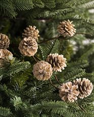 Closeup of artificial pinecone Christmas tree picks