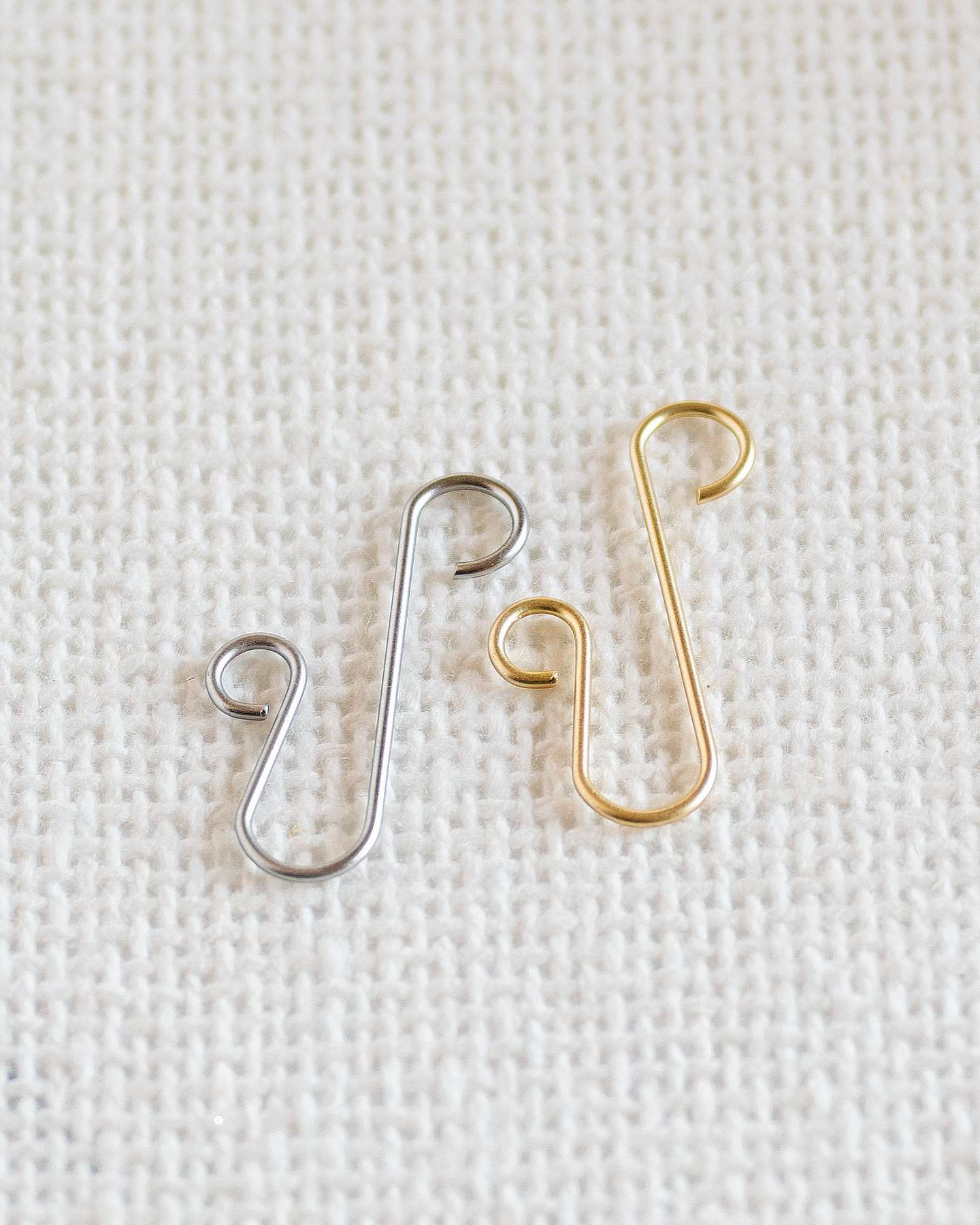 Balsam Hill Close-Up of Gold and Silver Ornament Hooks for Secure Hanging