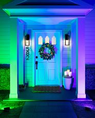 House façade with colored flood lights