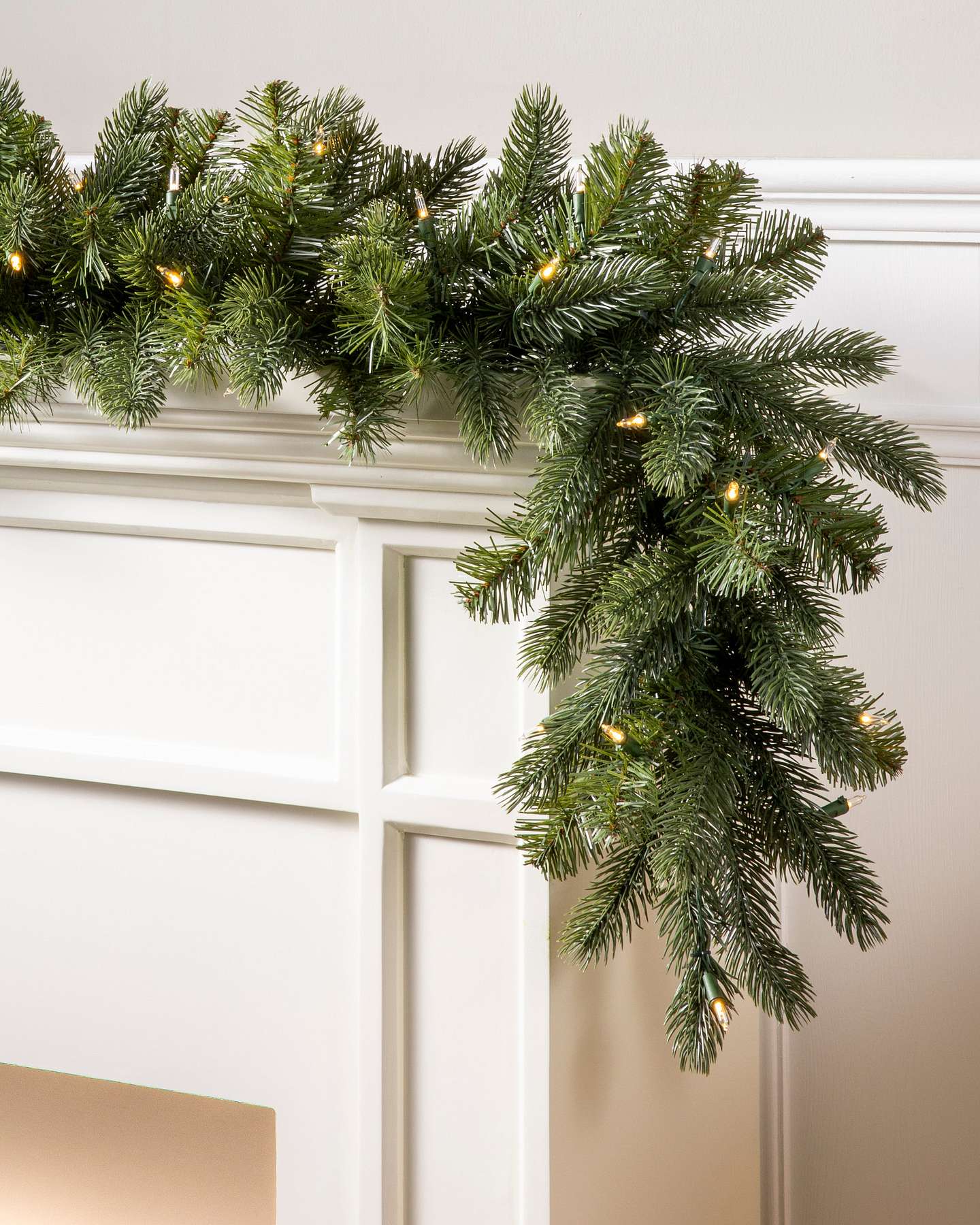 Balsam Hill Vermont White Spruce Christmas Garland in a Festive Holiday Display