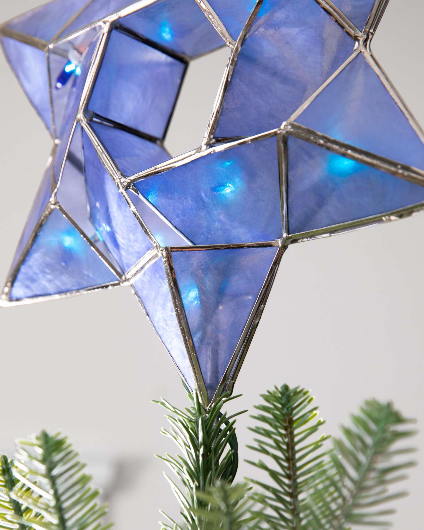 Balsam Hill 10-Inch Blue Lit Capiz Star of David Artificial Tree Topper Closeup View