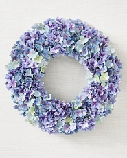 Artificial hydrangea wreath on a white background