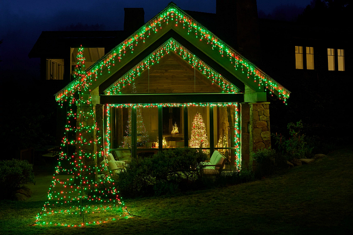 A house illuminated with multicolored Christmas lights