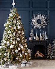 Pre-lit Christmas tree with winter ornaments