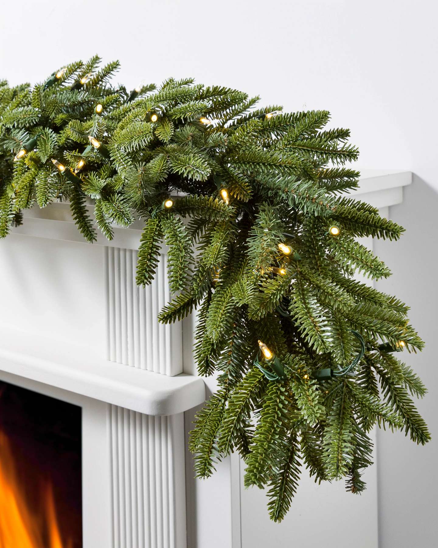 Balsam Hill Fraser Fir Artificial Christmas Garland 6-Foot with LED Clear Lights Fireplace Display
