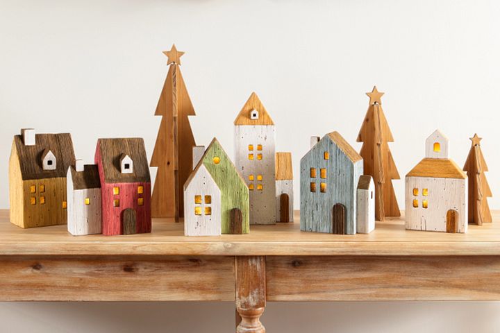 Set of farmhouse-themed wooden village houses and trees