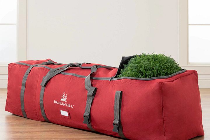 A slightly open red storage bag for topiaries