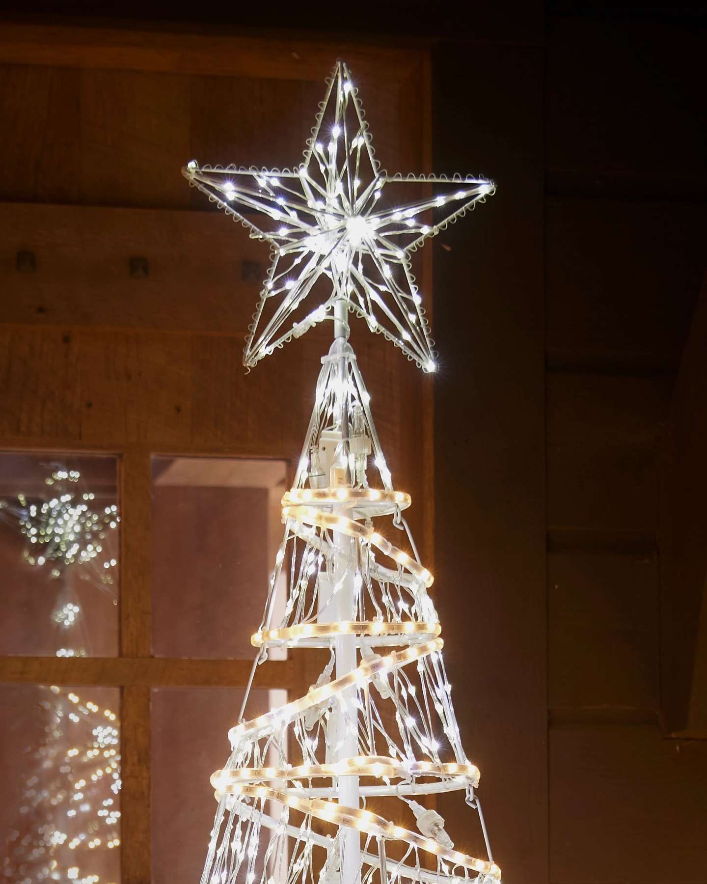 Balsam Hill Outdoor Lit Spiral Ribbon Tree Star Closeup