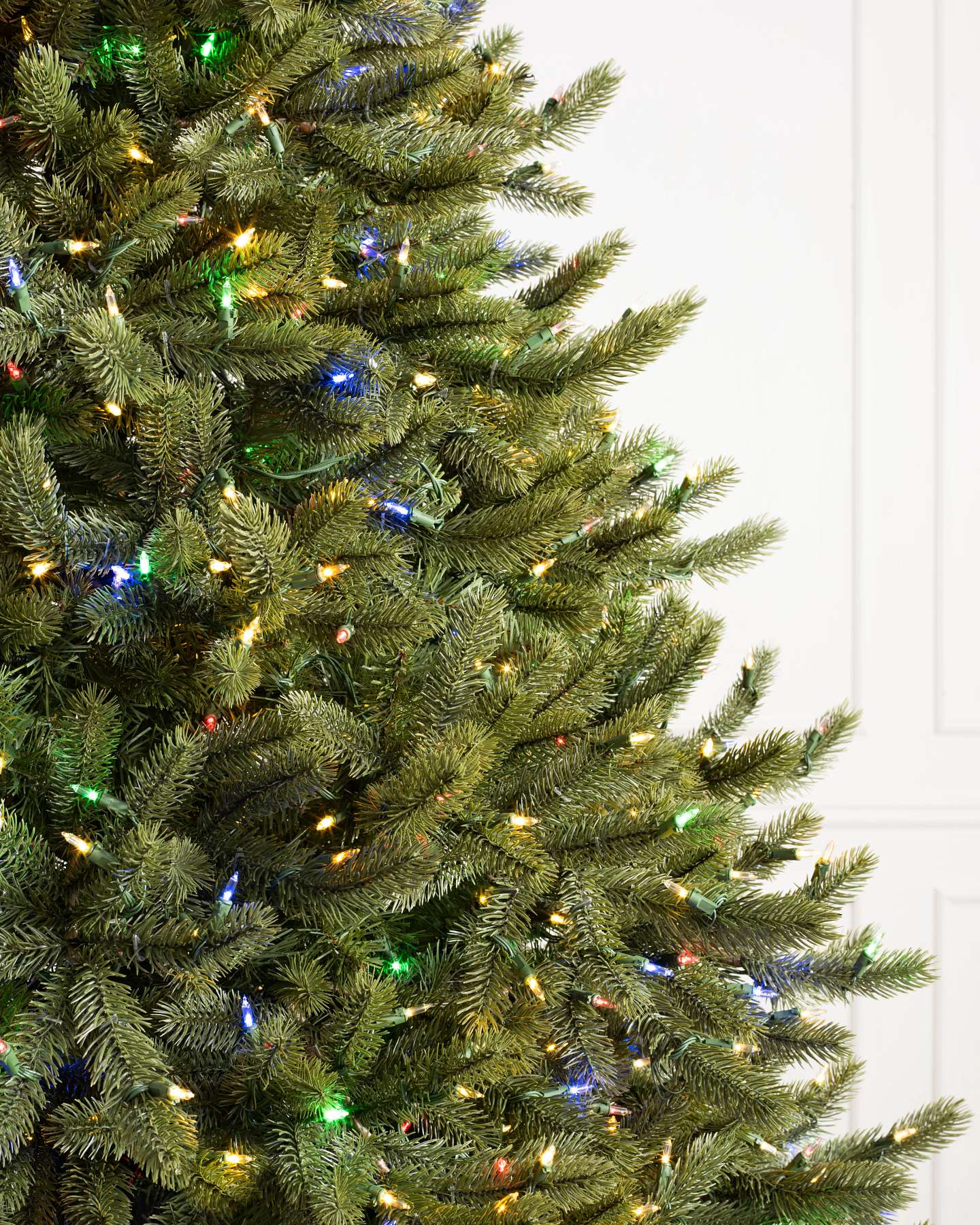 Balsam Hill Vermont White Spruce Wide Artificial Christmas Tree LED Color Changing Closeup