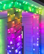 Multicoloured Christmas lights on porch column