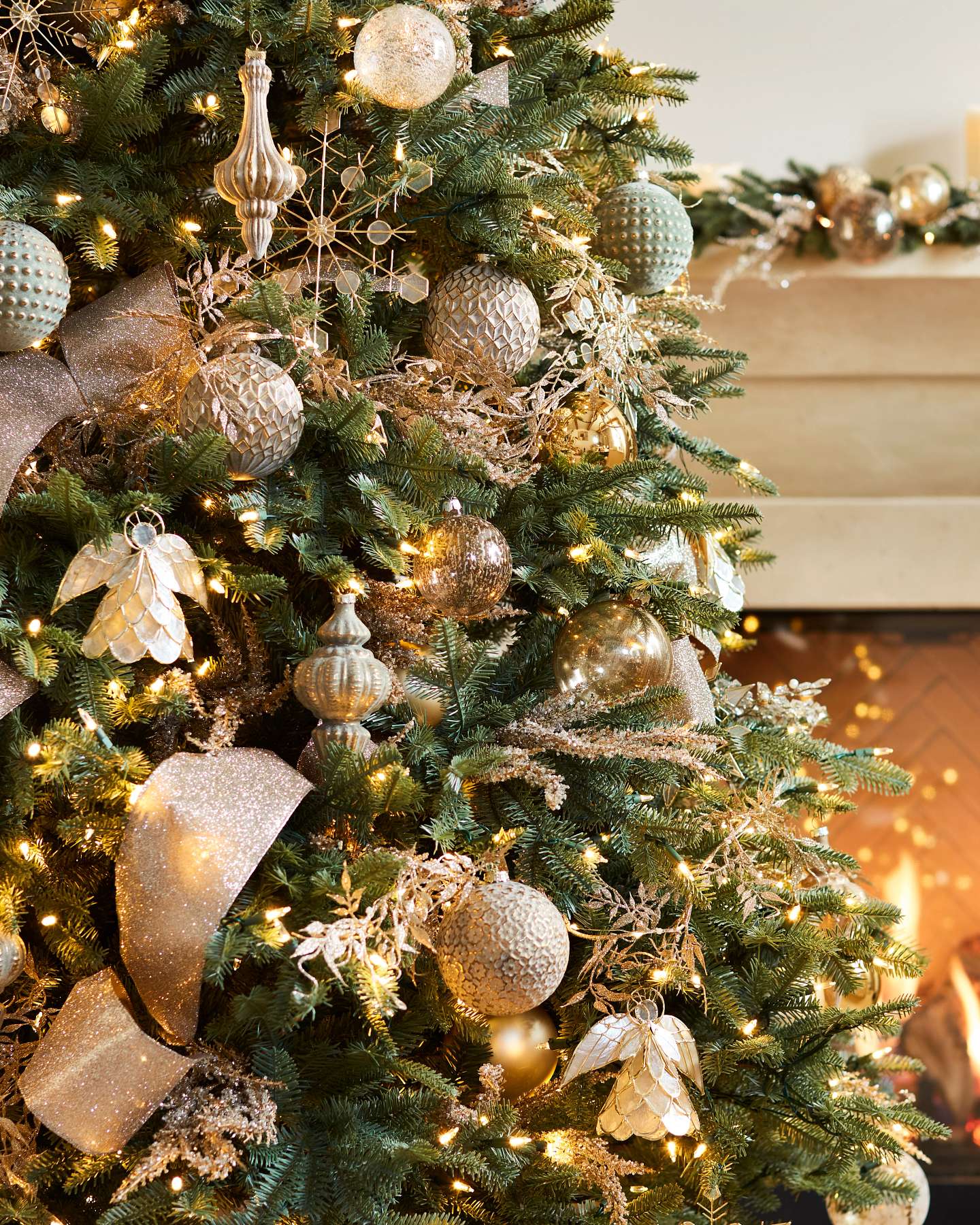 Balsam Hill Glitter Leaf Lighted Artificial Christmas Tree Garland Displayed on a Tree