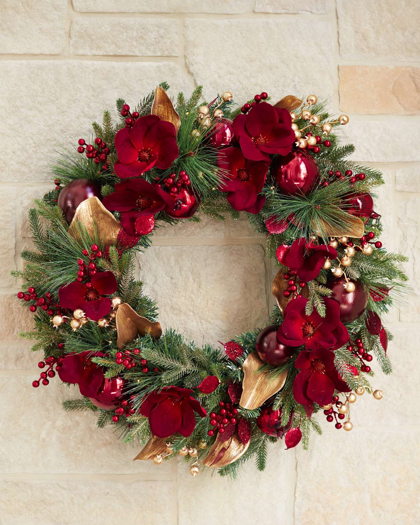 Balsam Hill Gilded Glory Magnolia Artificial Christmas Wreath in Entryway Setting