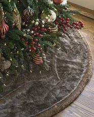 Faux fir tree skirts in gray, brown, and ivory colors