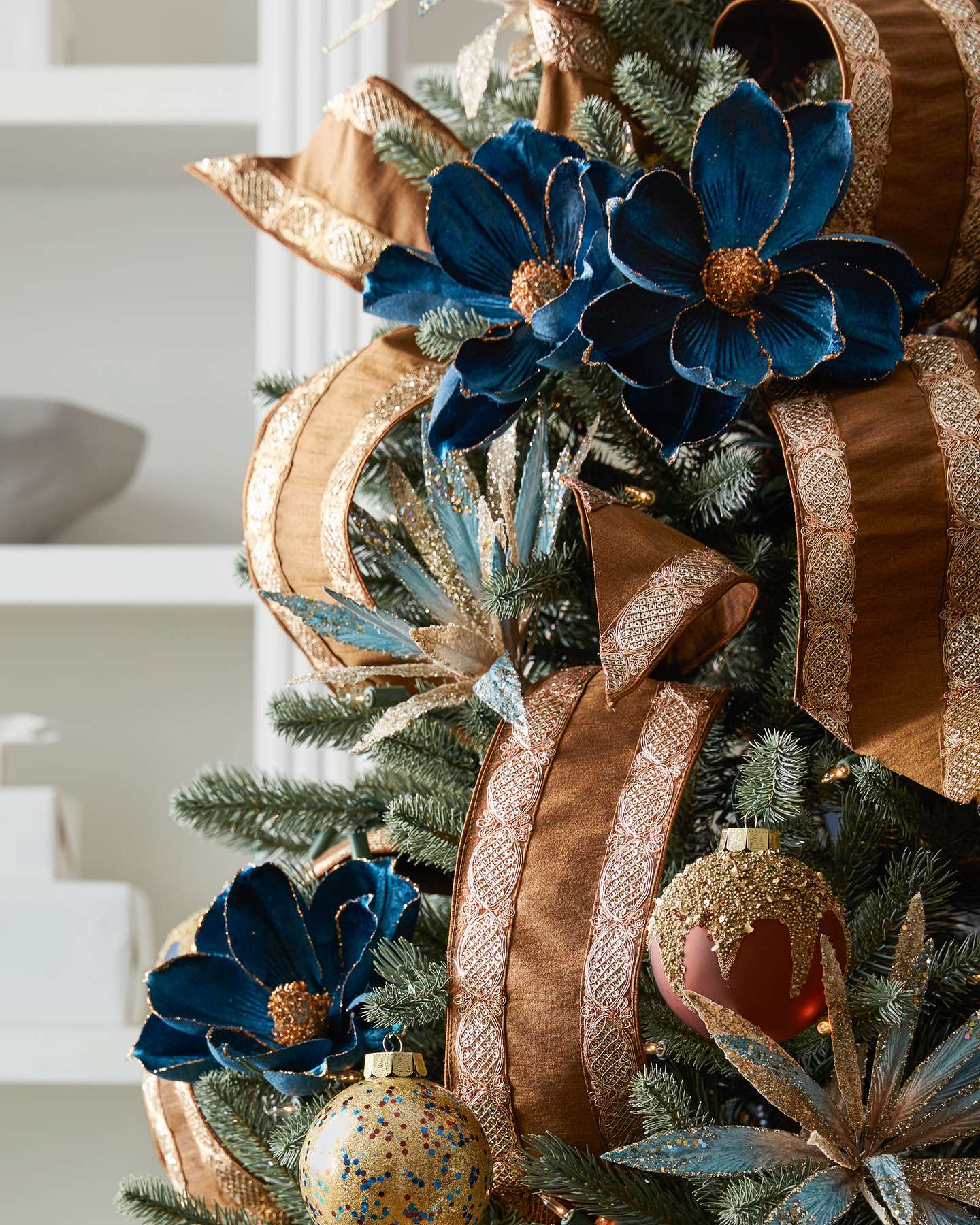 Balsam Hill Navy and Copper Magnolia Artificial Christmas Tree Picks Set of 12 Displayed on Tree