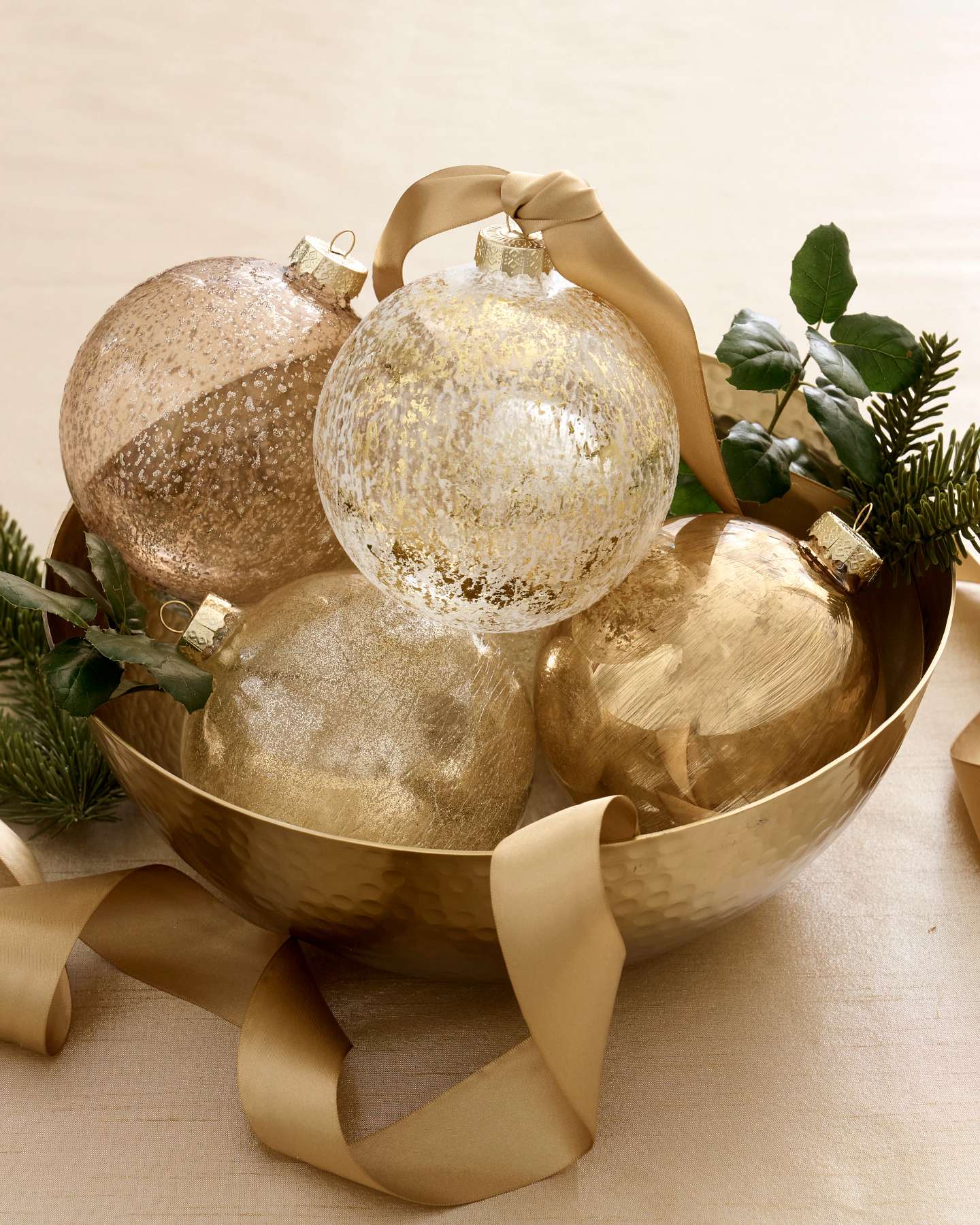 Balsam Hill Golden Glow Ball Christmas Ornament Set of 8 Displayed on a Golden Bowl