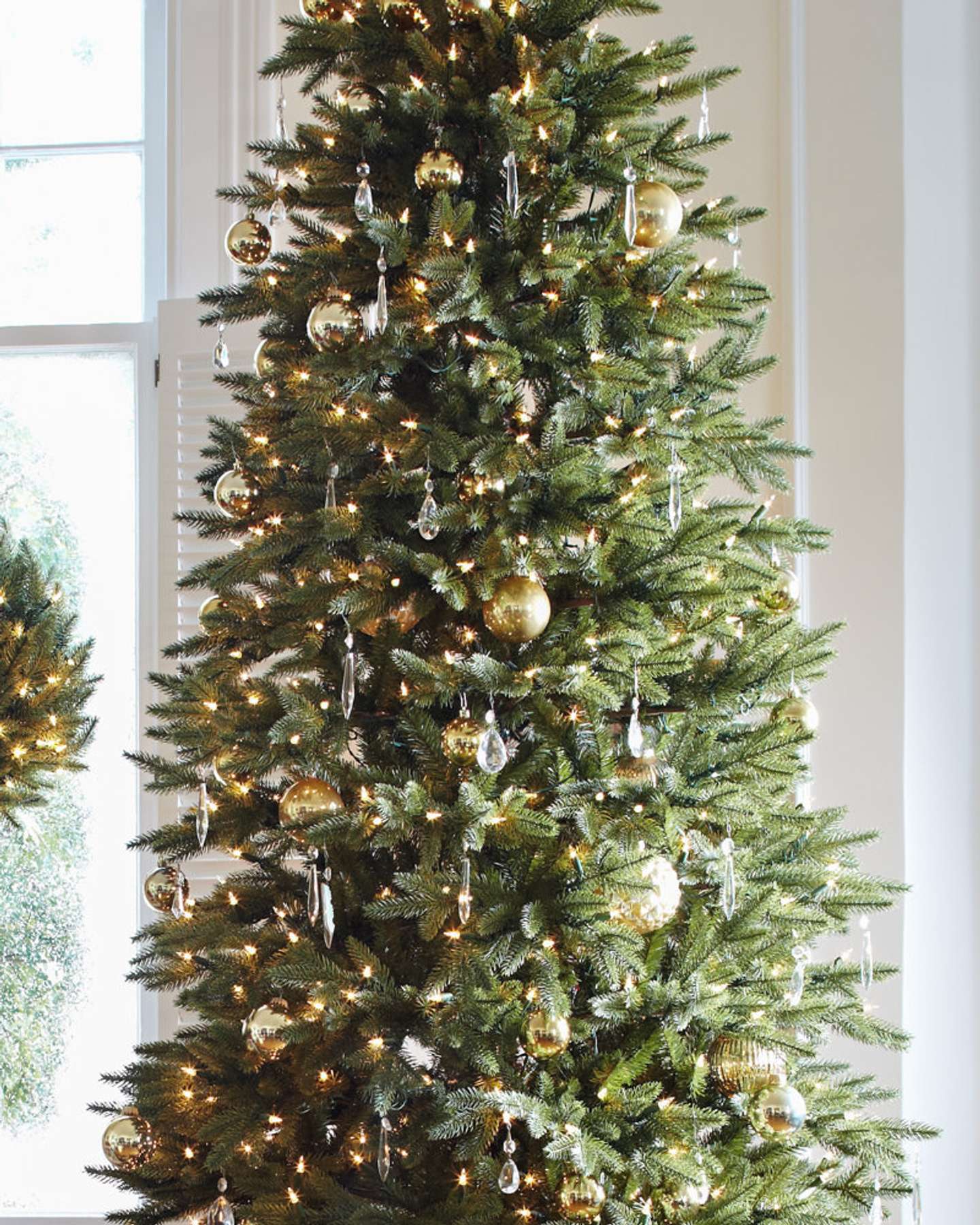 Balsam Hill Silverado Slim Christmas Tree Showcasing Warm White Lights
