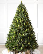 Scotch pine artificial Christmas tree pre-lit with clear lights