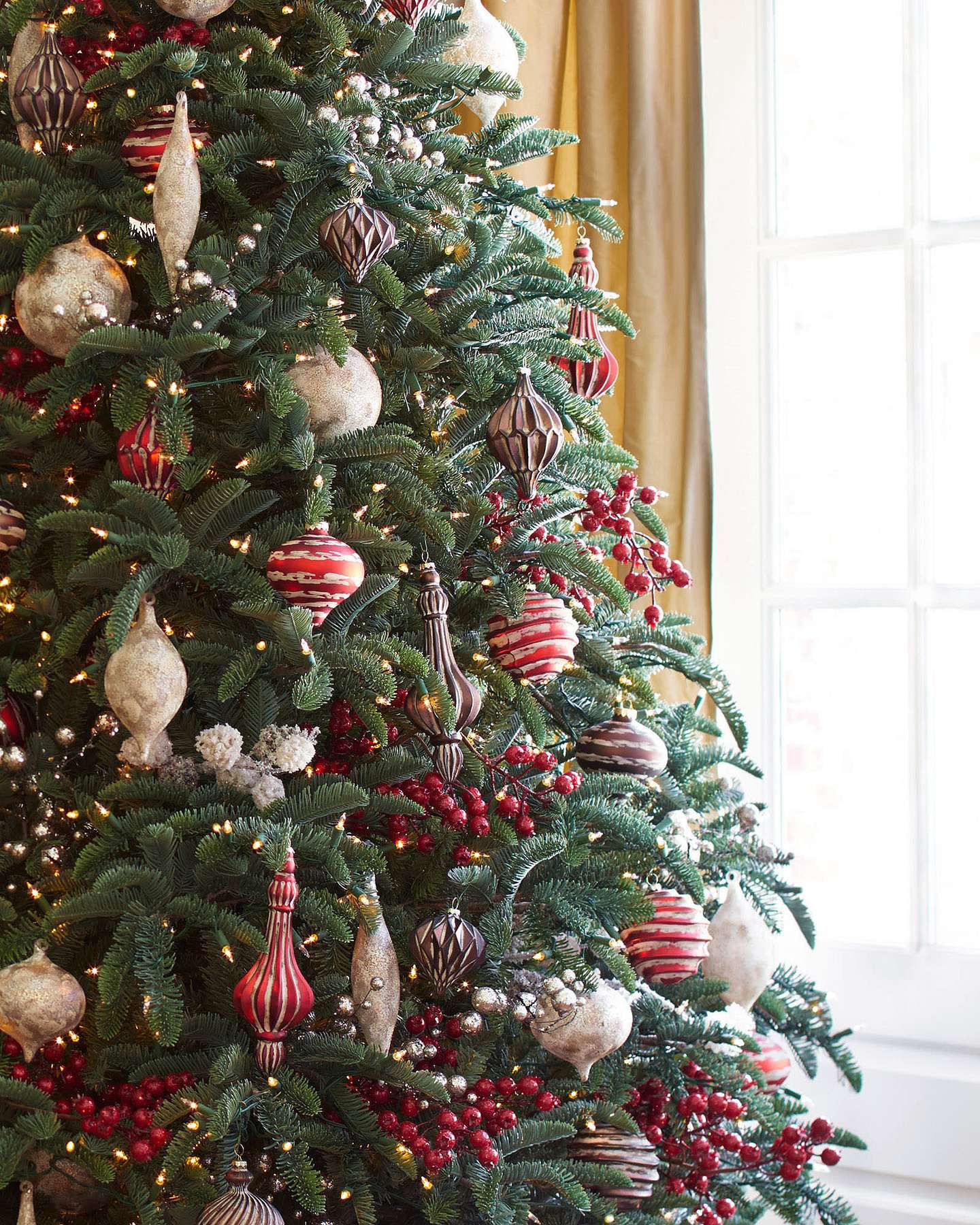 Balsam Hill Noble Fir Narrow Artificial Christmas Tree Lifestyle Display Near Window
