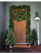 Glass door decorated with Christmas garland