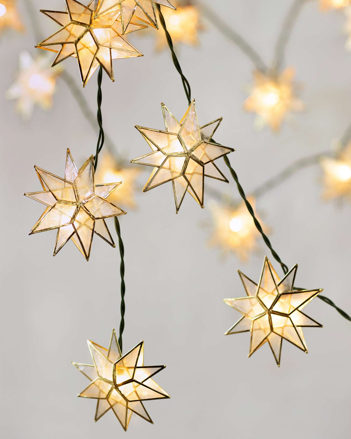 Balsam Hill Capiz Star Lighted Garland Lifestyle Display Closeup