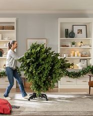 Woman setting up a Flip Tree