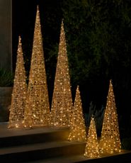 Group of lit wire cone trees