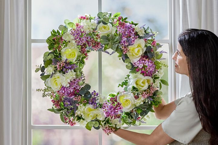 Artificial flower wreath with  lilac, rose, lavender, and hydrangea